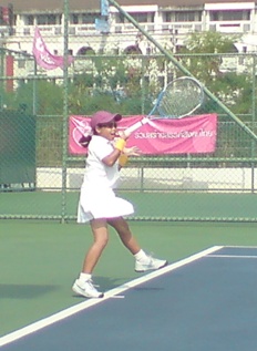 Poonky hitting a forehand
