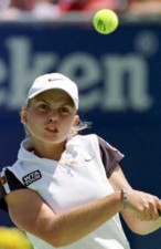 jelena dokic watching a tennis ball
